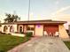 Charming single story home with a two car garage and manicured lawn at 461 Clover Rd, Venice, FL 34293