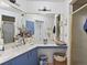Bathroom with corner vanity and walk-in shower at 6101 34Th W St # 16A, Bradenton, FL 34210