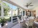 Relaxing screened patio with outdoor seating and lush greenery views at 6101 34Th W St # 16A, Bradenton, FL 34210