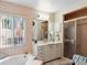 Bathroom with a shower, bathtub, and single vanity at 6101 34Th W St # 16A, Bradenton, FL 34210