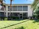 Building exterior showcasing a two-story building with screened balconies at 6101 34Th W St # 16A, Bradenton, FL 34210