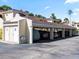 Covered carport parking with storage units at 6101 34Th W St # 16A, Bradenton, FL 34210