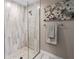 Large walk-in shower with herringbone patterned tile at 3800 Davis Blvd, Sarasota, FL 34232