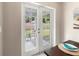 French doors leading to a private backyard patio at 3800 Davis Blvd, Sarasota, FL 34232