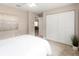 Bright bedroom with double doors and carpet at 3800 Davis Blvd, Sarasota, FL 34232