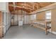 Workshop area with workbench and overhead storage at 3800 Davis Blvd, Sarasota, FL 34232