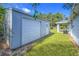 Detached shed with white garage door at 3800 Davis Blvd, Sarasota, FL 34232