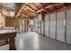 Workshop with workbench, storage, and garage door at 3800 Davis Blvd, Sarasota, FL 34232