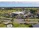 Aerial view of country club with golf course, pool, and clubhouse at 2715 Terra Ceia Bay Blvd # 702, Palmetto, FL 34221