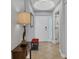 Bright entryway with tile flooring, bench, and a decorative table at 2715 Terra Ceia Bay Blvd # 702, Palmetto, FL 34221