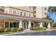 Inviting building entrance with landscaping and covered walkway at 2715 Terra Ceia Bay Blvd # 702, Palmetto, FL 34221