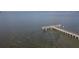 Wooden walkway dock extending over calm waters at 2715 Terra Ceia Bay Blvd # 702, Palmetto, FL 34221