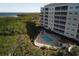 Resort-style pool and spa with lush landscaping and boardwalk at 2715 Terra Ceia Bay Blvd # 702, Palmetto, FL 34221