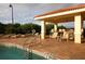 Relaxing pool area with shaded seating and lounge chairs at 2715 Terra Ceia Bay Blvd # 702, Palmetto, FL 34221