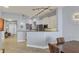 Modern kitchen with white cabinets, granite counters, and stainless steel appliances at 2715 Terra Ceia Bay Blvd # 702, Palmetto, FL 34221