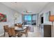 Spacious dining area with bayfront view and stylish furnishings at 2715 Terra Ceia Bay Blvd # 702, Palmetto, FL 34221