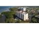 Luxury condo building with private pool and lush landscaping at 2715 Terra Ceia Bay Blvd # 702, Palmetto, FL 34221