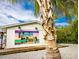 Postcard mural depicting Anna Maria Island, Florida. Beachy vibe at 316 Spring Ave, Anna Maria, FL 34216