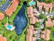 Aerial view of community with lake and villas at 3124 Windrush Bourne # 10, Sarasota, FL 34235
