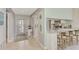 Bright entryway with view of updated kitchen at 3124 Windrush Bourne # 10, Sarasota, FL 34235