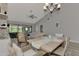 Bright dining area with view to living room at 3124 Windrush Bourne # 10, Sarasota, FL 34235