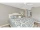 Main bedroom with king bed and access to the bathroom and patio at 3124 Windrush Bourne # 10, Sarasota, FL 34235