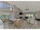Spacious dining area with wood table and chairs at 3124 Windrush Bourne # 10, Sarasota, FL 34235