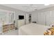 Comfortable bedroom with plenty of closet space and a view of the living area at 3124 Windrush Bourne # 10, Sarasota, FL 34235