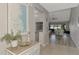 Entryway with view to living room and kitchen at 3124 Windrush Bourne # 10, Sarasota, FL 34235