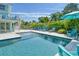 Stunning pool and patio area with ample seating at 1655 Memory Ln, Sarasota, FL 34231