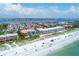 Stunning aerial view of condo with private beach access and views of the Gulf of Mexico and St. Joseph's Sound at 1900 Gulf N Dr # 4, Bradenton Beach, FL 34217