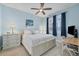 Comfortable bedroom with natural light, a ceiling fan, and a queen-sized bed at 1900 Gulf N Dr # 4, Bradenton Beach, FL 34217