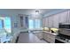 Well-equipped kitchen offering ample counter space and cabinetry with views to the Gulf at 1900 Gulf N Dr # 4, Bradenton Beach, FL 34217