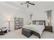 Main bedroom with king-size bed and access to backyard at 5713 Cheech Gln, Lakewood Ranch, FL 34211