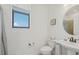 Clean and bright bathroom with toilet, sink, and shower at 5713 Cheech Gln, Lakewood Ranch, FL 34211