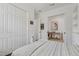 Bedroom with walk-in closet and an adjacent office space at 5713 Cheech Gln, Lakewood Ranch, FL 34211