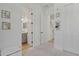 bedroom with access to bathroom and hallway at 5713 Cheech Gln, Lakewood Ranch, FL 34211
