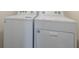 Laundry room with side-by-side washer and dryer at 11440 Planetree Pl, Bradenton, FL 34211