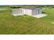 Metal building with large overhead doors at 23800 Jennings Rd, Myakka City, FL 34251