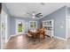 Bright dining room with wooden table and rustic hutch at 23800 Jennings Rd, Myakka City, FL 34251