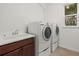 Laundry room with washer, dryer, and sink at 4618 Arbor Gate Dr, Bradenton, FL 34203