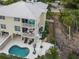 Aerial view of two-story house with private pool and patio at 447 Canal Rd # 447, Sarasota, FL 34242