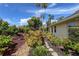 Landscaped garden path with lush greenery at 2103 89Th Nw St, Bradenton, FL 34209