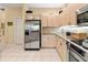 Modern kitchen with stainless steel appliances and granite countertops at 2103 89Th Nw St, Bradenton, FL 34209