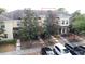 Charming townhome boasts a welcoming front entrance and well-kept landscaping at 10959 Keys Gate Dr, Riverview, FL 33579