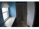 Bathroom featuring vanity area, with a window view and a shower behind a glass door at 6064 Shearwater Dr, Englewood, FL 34224