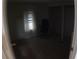 Standard bedroom with carpet and a window at 6064 Shearwater Dr, Englewood, FL 34224
