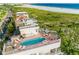 Unique rooftop pool and lounge area with stunning ocean views in this beachfront property at 648 Beach Rd, Sarasota, FL 34242