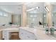 Luxurious bathroom featuring a large soaking tub, vanity, and custom fixtures at 648 Beach Rd, Sarasota, FL 34242