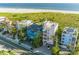 Beautiful beach house with a rooftop pool and gorgeous views of the water and beach at 648 Beach Rd, Sarasota, FL 34242